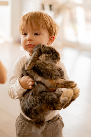 children-play-with-easter-bunnies